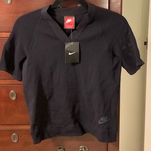 Black Nike short sleeve fitted waist v neck shirt